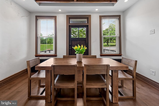 dining space with wood finished floors, recessed lighting, and baseboards