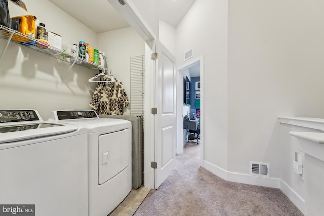 7853 Bluelick Run Rd, Baltimore, MD 21244 - washroom with washer and dryer, light colored carpet, and baseboards