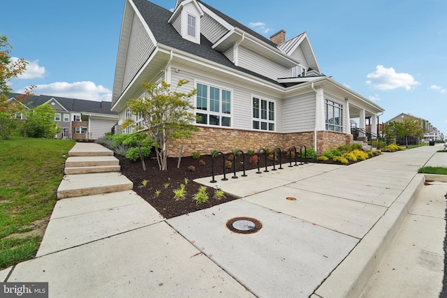 7853 Bluelick Run Rd, Baltimore, MD 21244 - view of front of home with stone siding and roof with shingles