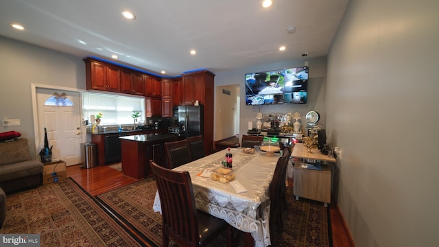 1834 Mower St, Philadelphia, PA 19152 - kitchen featuring black appliances, recessed lighting, backsplash, wood finished floors, and reddish brown cabinets