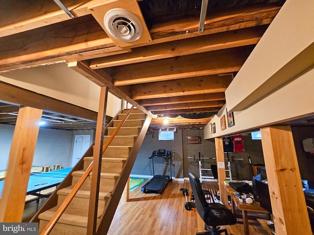 workout area featuring wood finished floors