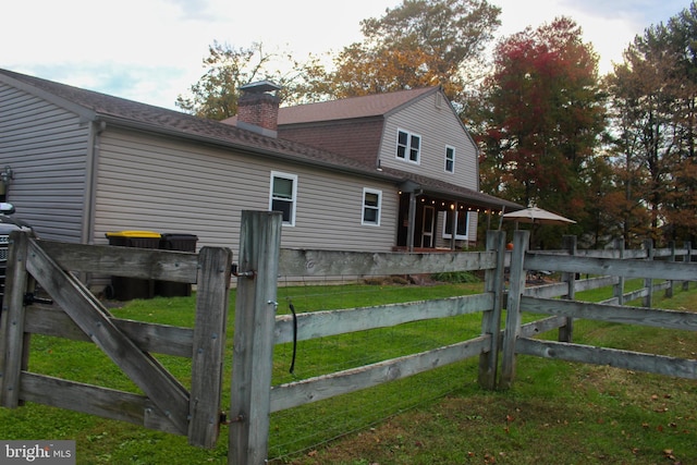 view of side of property featuring a chimney