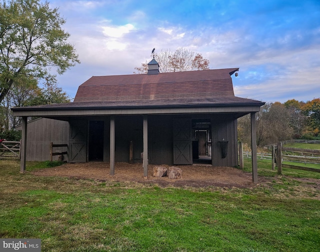 view of outbuilding with an outdoor structure and an exterior structure