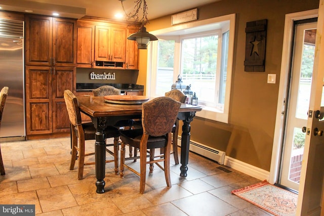 dining area featuring a baseboard radiator, baseboards, and recessed lighting