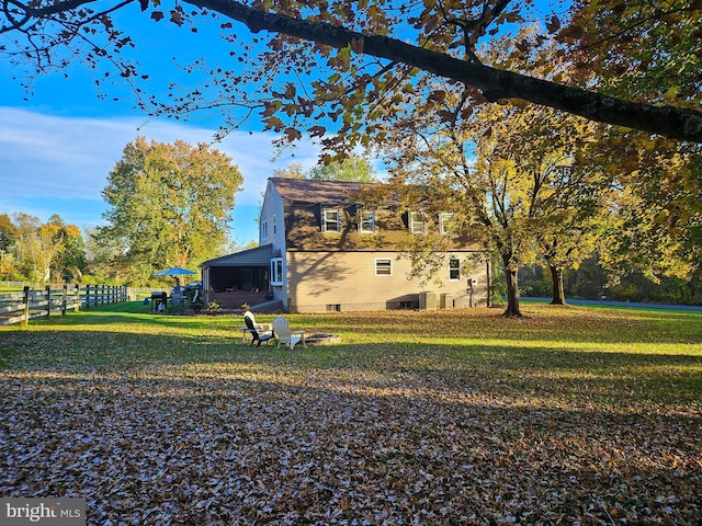 view of side of home with a sunroom