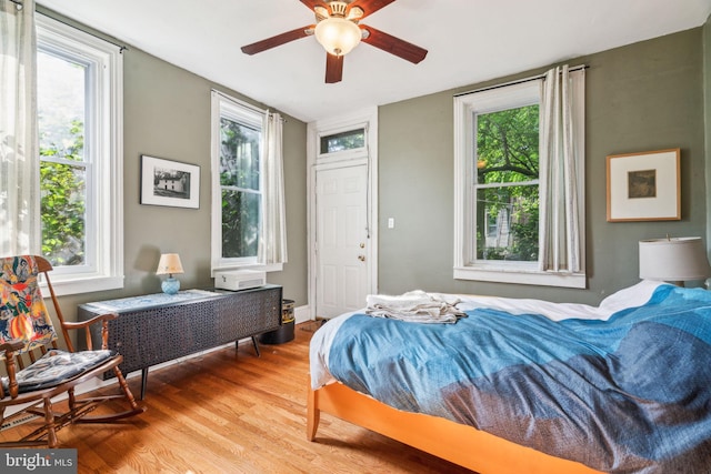 bedroom featuring light wood-style floors