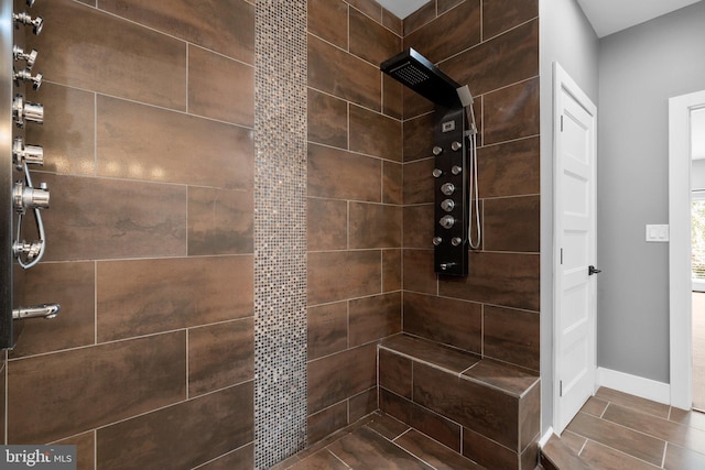36 Boone Trl, Severna Park, MD 21146 - bathroom featuring tiled shower and baseboards