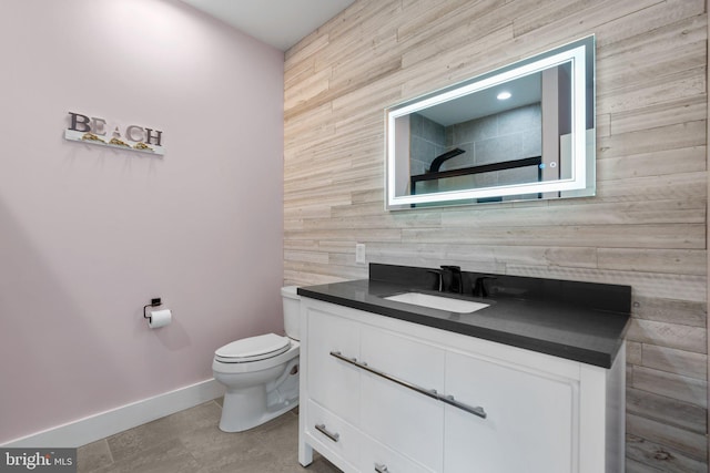 36 Boone Trl, Severna Park, MD 21146 - full bathroom with baseboards, vanity, toilet, tasteful backsplash, and tile patterned floors