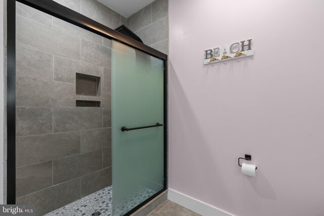 36 Boone Trl, Severna Park, MD 21146 - bathroom with a shower stall and tile patterned floors