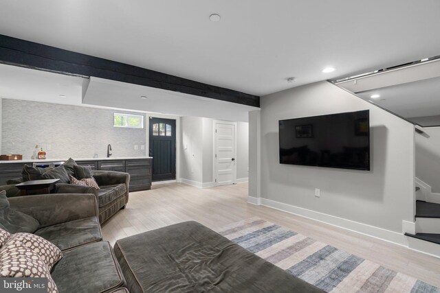 36 Boone Trl, Severna Park, MD 21146 - living area featuring light wood-style flooring, recessed lighting, baseboards, stairs, and bar area