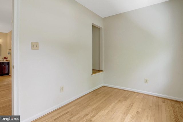 1807 N Barton St, Arlington, VA 22201 - empty room with light wood-style flooring and baseboards