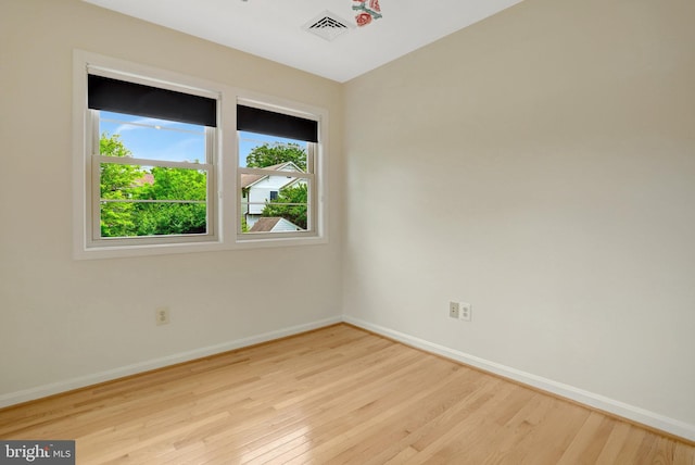 1807 N Barton St, Arlington, VA 22201 - spare room with wood finished floors and baseboards