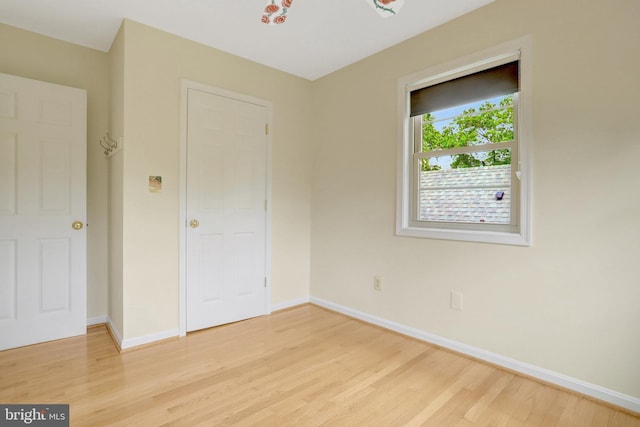 1807 N Barton St, Arlington, VA 22201 - unfurnished bedroom featuring light wood-style flooring and baseboards