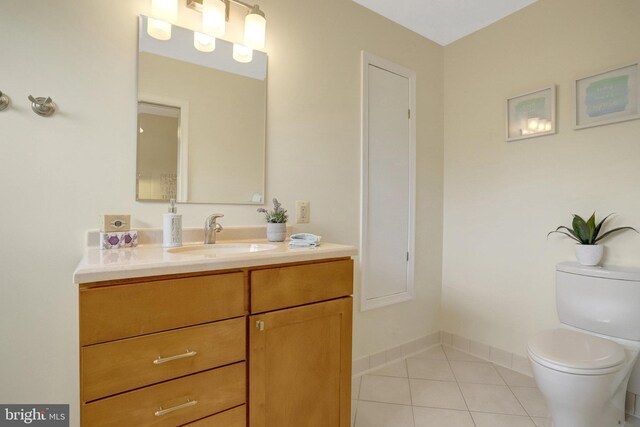 1807 N Barton St, Arlington, VA 22201 - bathroom featuring tile patterned flooring, toilet, vanity, and baseboards