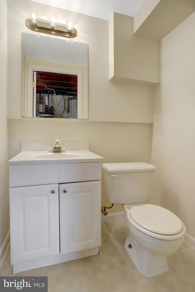 1807 N Barton St, Arlington, VA 22201 - bathroom with baseboards, toilet, and vanity