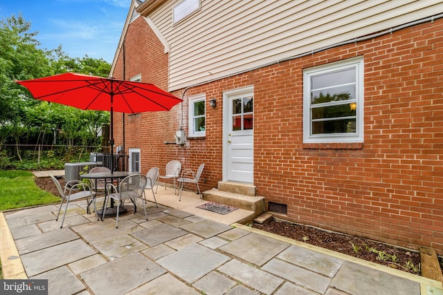 1807 N Barton St, Arlington, VA 22201 - view of patio / terrace with entry steps, fence, central air condition unit, and outdoor dining area