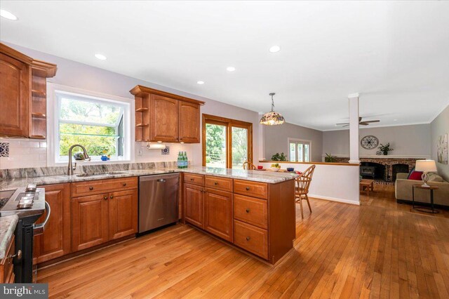 kitchen featuring stainless steel dishwasher, open shelves, electric range oven, a peninsula, and light wood-type flooring
