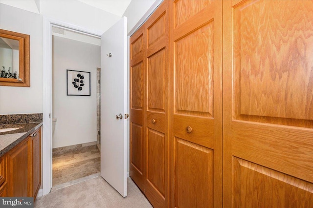 hall with light carpet