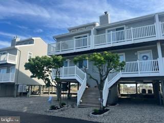 441 E Bay Unit 8, Barnegat, NJ 08005 - back of house with a carport, a balcony, stairway, and a chimney
