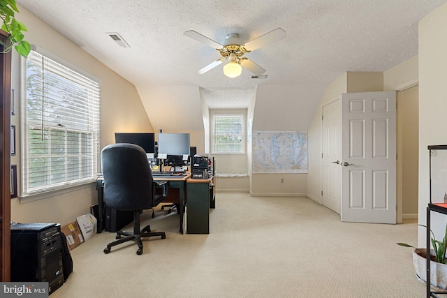 office with carpet, a ceiling fan, a textured ceiling, and baseboards
