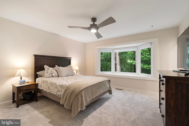 5731 Wooden Spoon Ct, Burke, VA 22015 - bedroom featuring baseboards, light carpet, and a ceiling fan