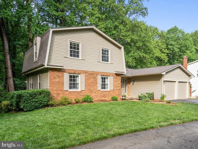 5731 Wooden Spoon Ct, Burke, VA 22015 - colonial inspired home featuring a gambrel roof, driveway, an attached garage, brick siding, and a front yard