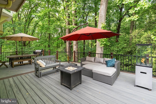 5731 Wooden Spoon Ct, Burke, VA 22015 - deck featuring an outdoor living space with a fire pit and outdoor dining space