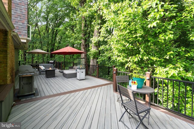 5731 Wooden Spoon Ct, Burke, VA 22015 - wooden terrace with a grill