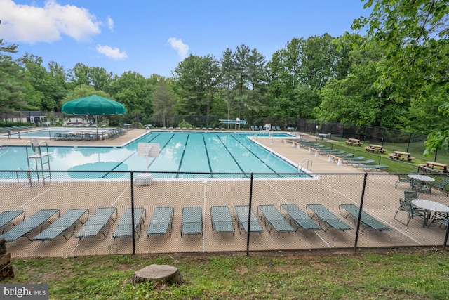5731 Wooden Spoon Ct, Burke, VA 22015 - community pool featuring fence, view of scattered trees, and a patio area