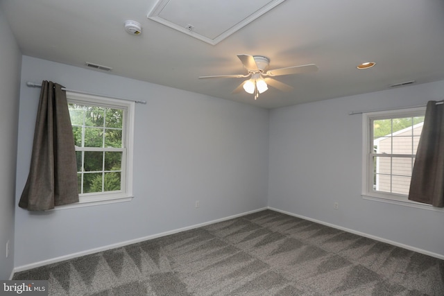 16 Cotswold Way, Sewell, NJ 08080 - unfurnished room with dark colored carpet, a smoke detector, plenty of natural light, a ceiling fan, and recessed lighting