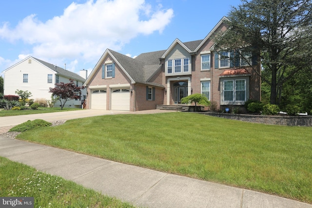 16 Cotswold Way, Sewell, NJ 08080 - view of front of home featuring brick siding, driveway, a front yard, and an attached garage