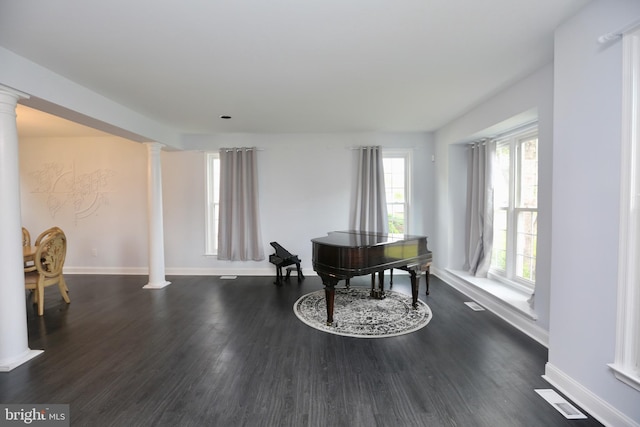 16 Cotswold Way, Sewell, NJ 08080 - living area featuring decorative columns, dark wood finished floors, and baseboards
