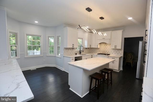 16 Cotswold Way, Sewell, NJ 08080 - kitchen featuring a sink, appliances with stainless steel finishes, backsplash, dark wood-style flooring, and healthy amount of natural light