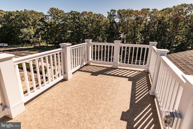 31447 Watershed Ln Unit 2, Bethany Beach, DE 19930 - wooden deck with view of scattered trees