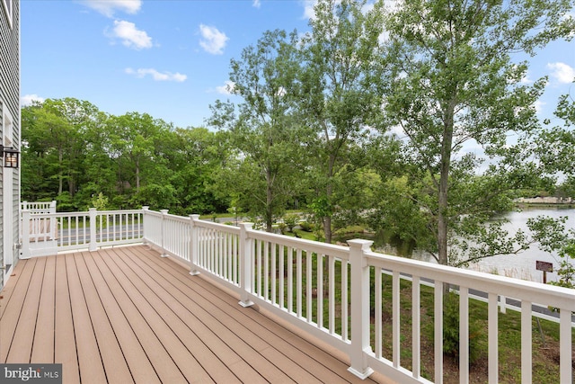 31447 Watershed Ln Unit 2, Bethany Beach, DE 19930 - deck featuring a water view and view of scattered trees