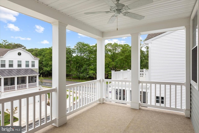 31447 Watershed Ln Unit 2, Bethany Beach, DE 19930 - balcony with a ceiling fan and view of scattered trees