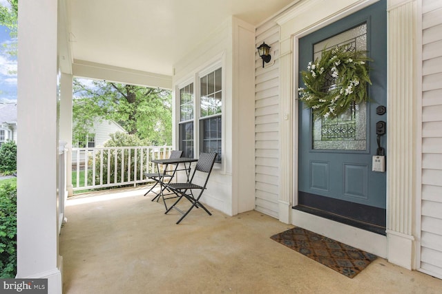 entrance to property with covered porch