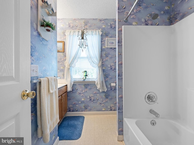 38284 Waterway Dr, Ocean View, DE 19970 - full bathroom featuring wallpapered walls, baseboards, washtub / shower combination, and vanity