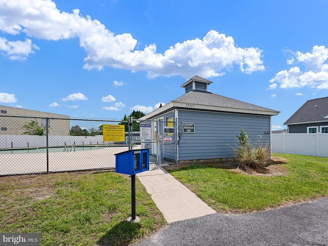 38284 Waterway Dr, Ocean View, DE 19970 - view of side of home with a gate