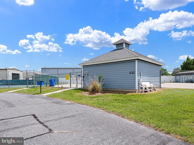 38284 Waterway Dr, Ocean View, DE 19970 - view of property exterior featuring a shingled roof