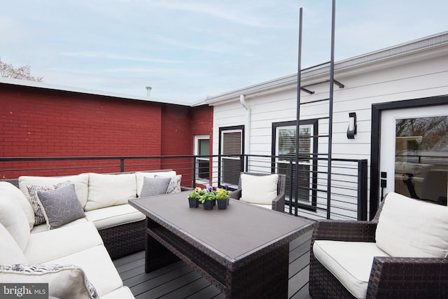 deck with an outdoor hangout area