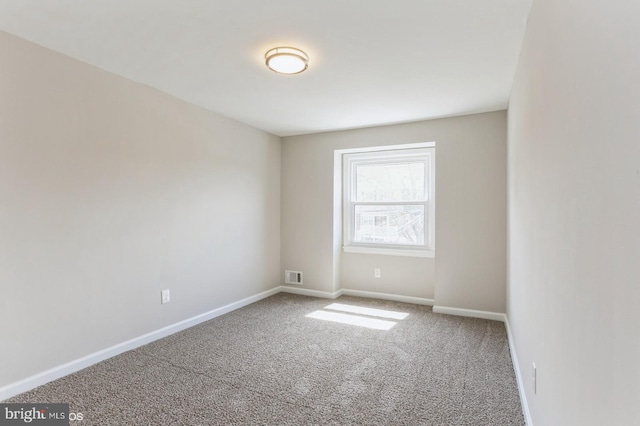 5415 Cynthia Ter, Baltimore, MD 21206 - carpeted empty room with baseboards