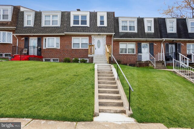 5415 Cynthia Ter, Baltimore, MD 21206 - view of property with roof with shingles, mansard roof, brick siding, and a front yard