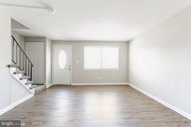 5415 Cynthia Ter, Baltimore, MD 21206 - entryway featuring wood finished floors, baseboards, and stairs