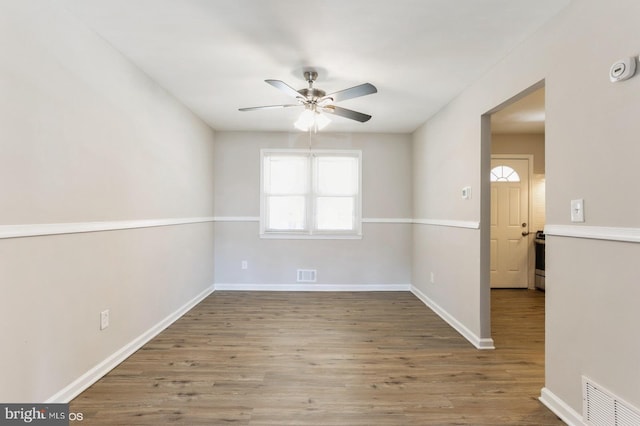 5415 Cynthia Ter, Baltimore, MD 21206 - unfurnished room featuring a ceiling fan, wood finished floors, and baseboards