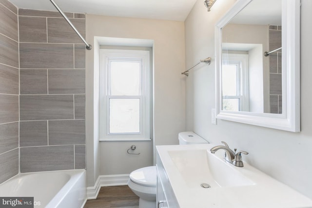 5415 Cynthia Ter, Baltimore, MD 21206 - bathroom featuring toilet, baseboards, vanity, shower / washtub combination, and wood finished floors