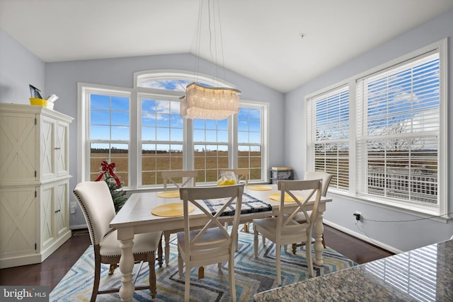 734 Holden Rd, Frederick, MD 21701 - dining space with vaulted ceiling, dark wood-type flooring, healthy amount of natural light, and baseboards