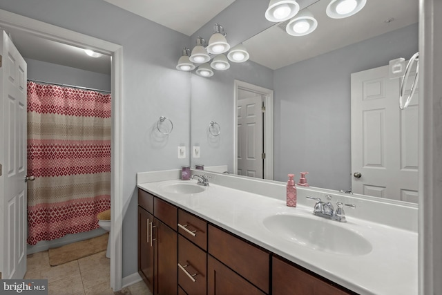 734 Holden Rd, Frederick, MD 21701 - full bath with double vanity, toilet, tile patterned flooring, and a shower with shower curtain