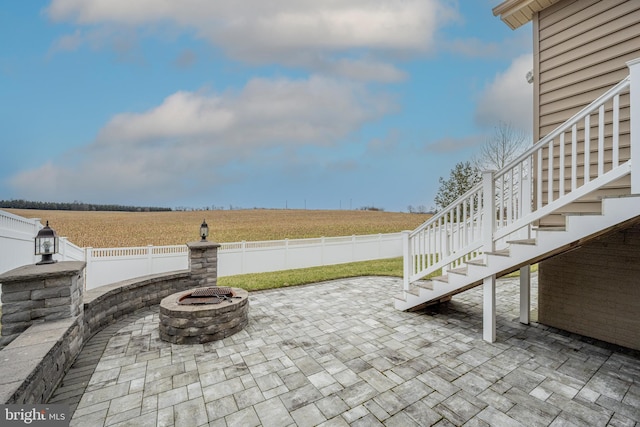 734 Holden Rd, Frederick, MD 21701 - view of patio with stairway, a view of countryside, an outdoor fire pit, and a fenced backyard