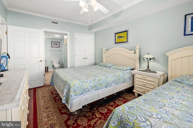 bedroom with ornamental molding, ensuite bathroom, a closet, and a ceiling fan